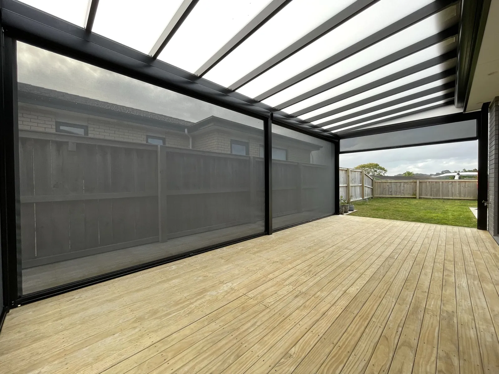 Ziptrak outdoor blinds enclosing a deck